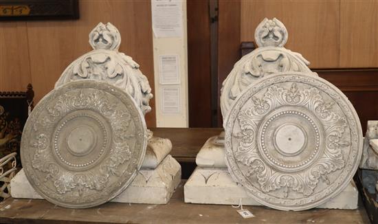 Seven cast plaster roundels and corbels